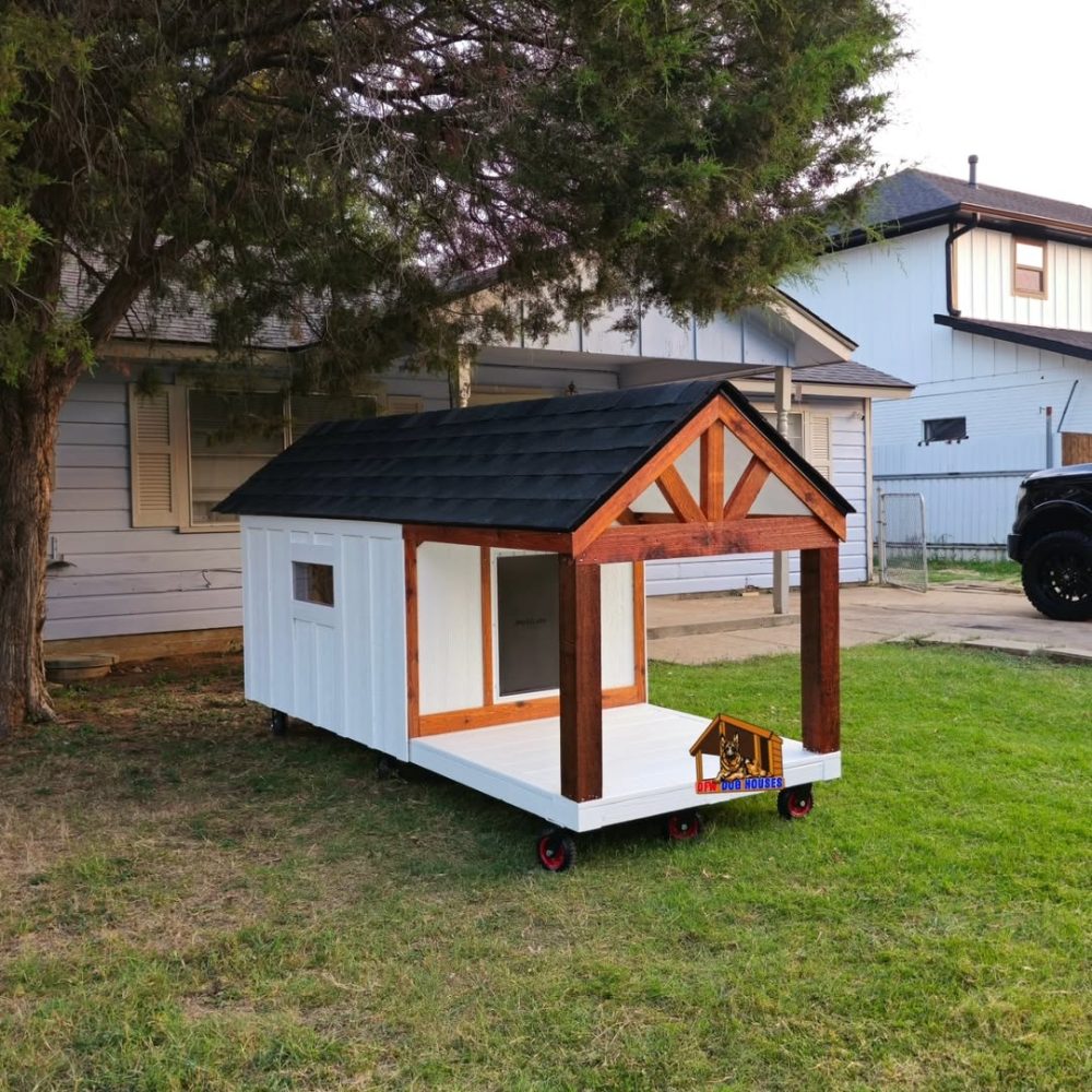 Stylish custom-built insulated dog house with white exterior and cedar accents, ideal for any backyard in the US, Canada, Australia.